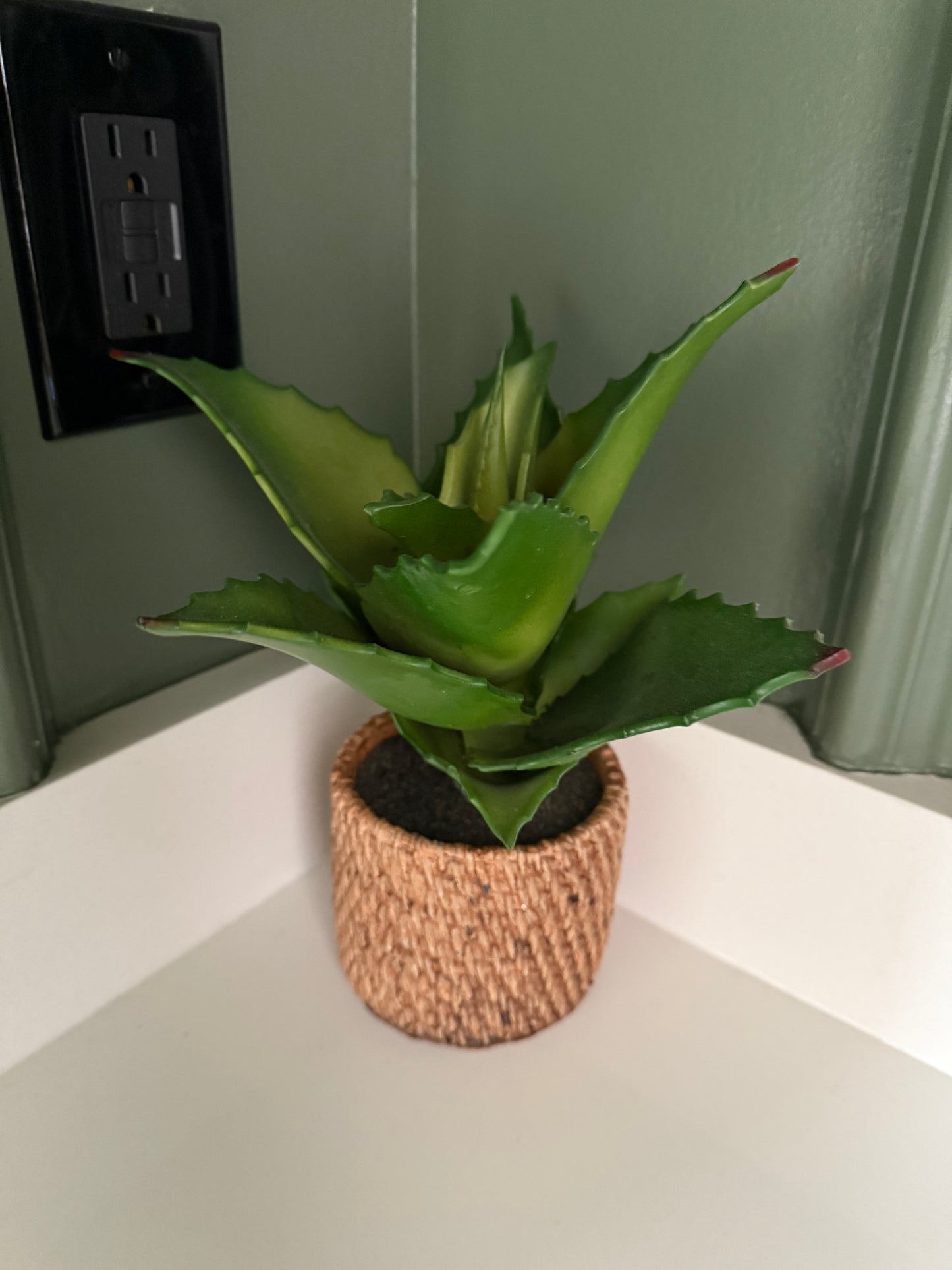 Faux Plant in Wicker Pot