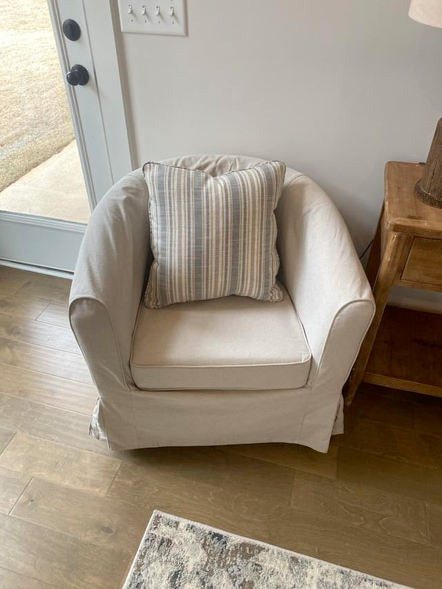 Cream Swivel Armchair