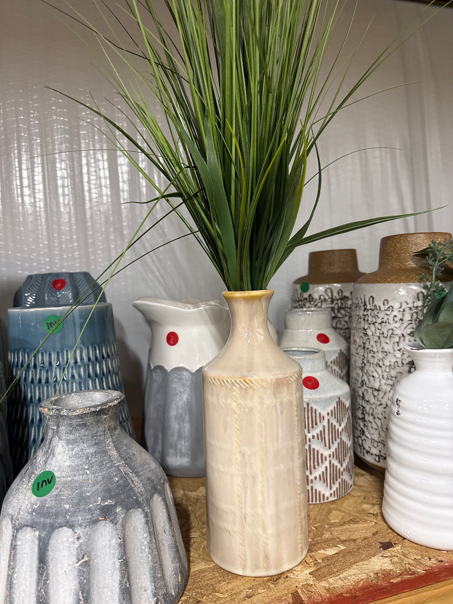 Cream Carved Bottle Vase with Faux Grass Stems