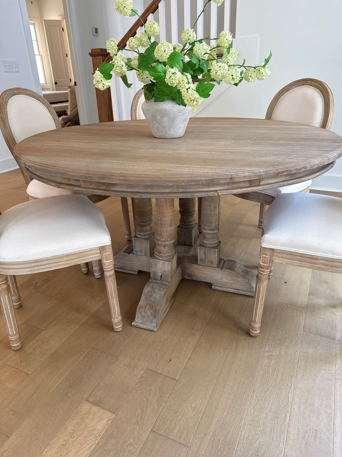 Round Light Distressed Wood Dining Table