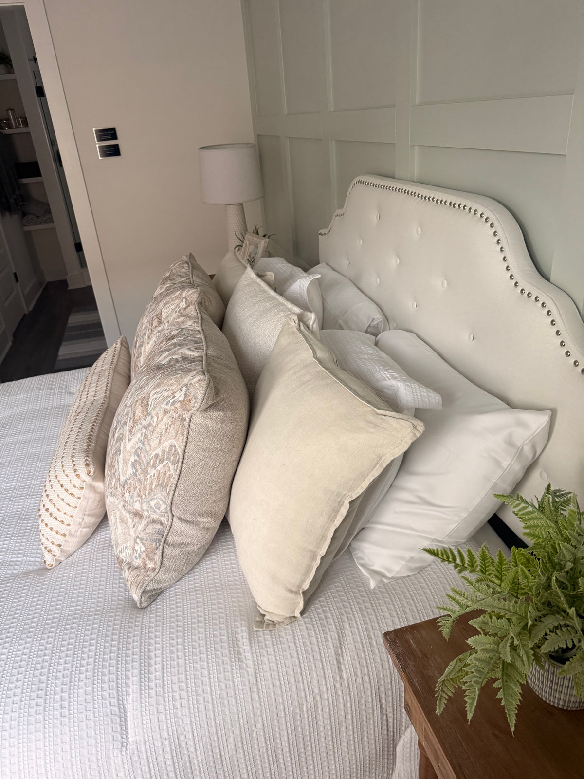 Blue, Cream, and Brown Patterned Pillow