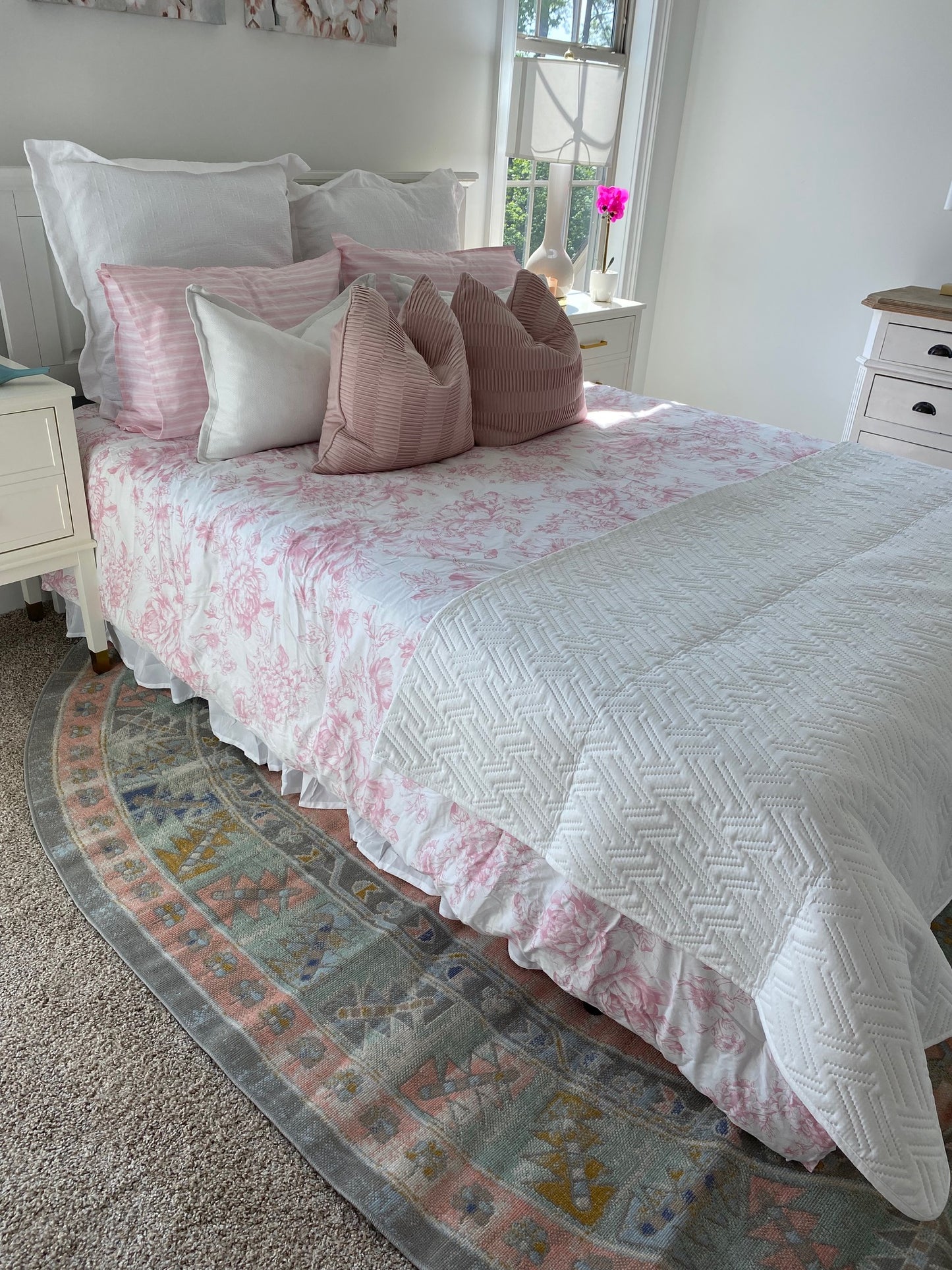 Pink and White Floral Quilt