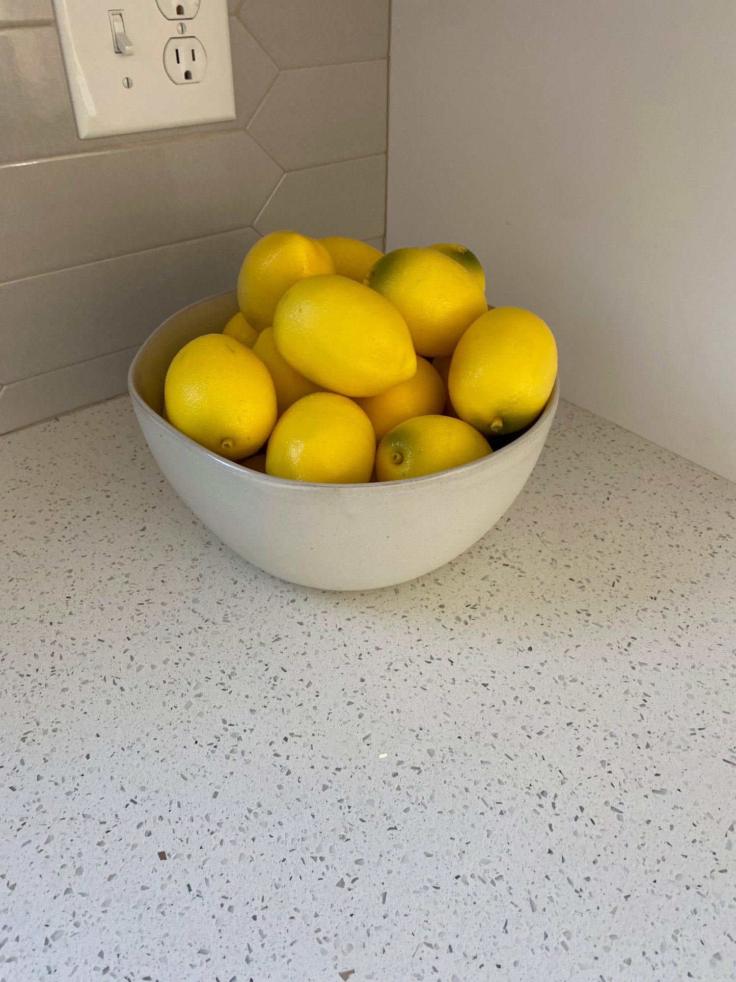 White Ceramic Bowl with Lemon Filler